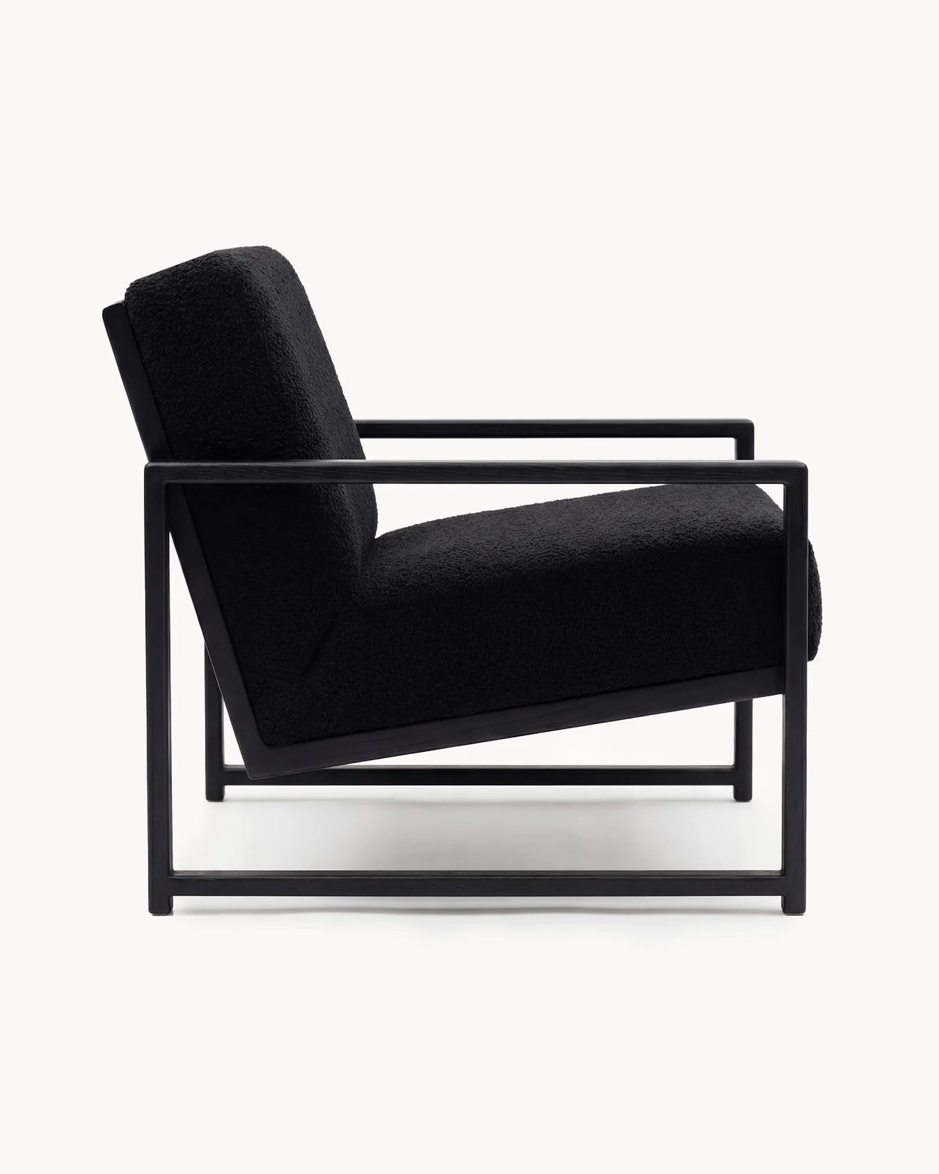 by Crea® Sessel EINAR Schwarzer Eichenrahmen Schwarzes Bouclé-Kissen